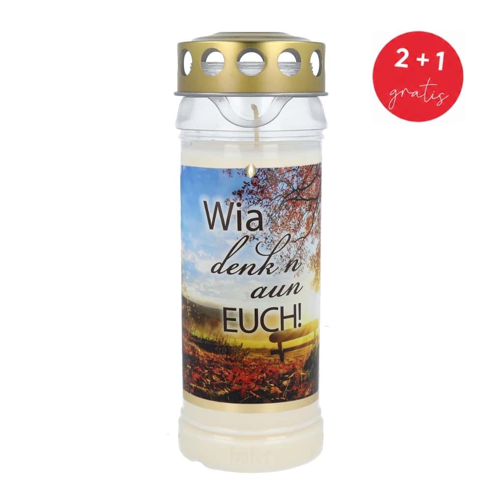 Grablicht mit goldenem Lochdeckel, Etikett mit Herbstbaum und Bank am Weg, Text 'Wia denk'n aun Euch!'