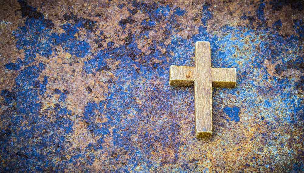 Trauersprüche Kreuz auf blauem Untergrund