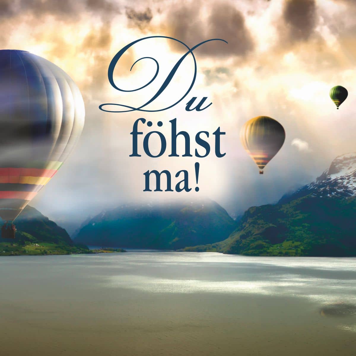 Motiv Heißluftballons in Berglandschaft mit Text "Du föhst ma!"